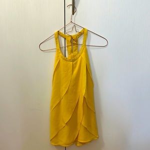 Canary Yellow racer back top can work for work or evenings out